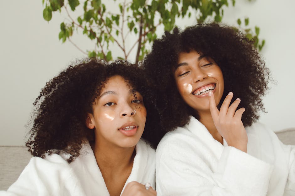 Two women enjoying a skincare routine, showcasing happiness and natural beauty